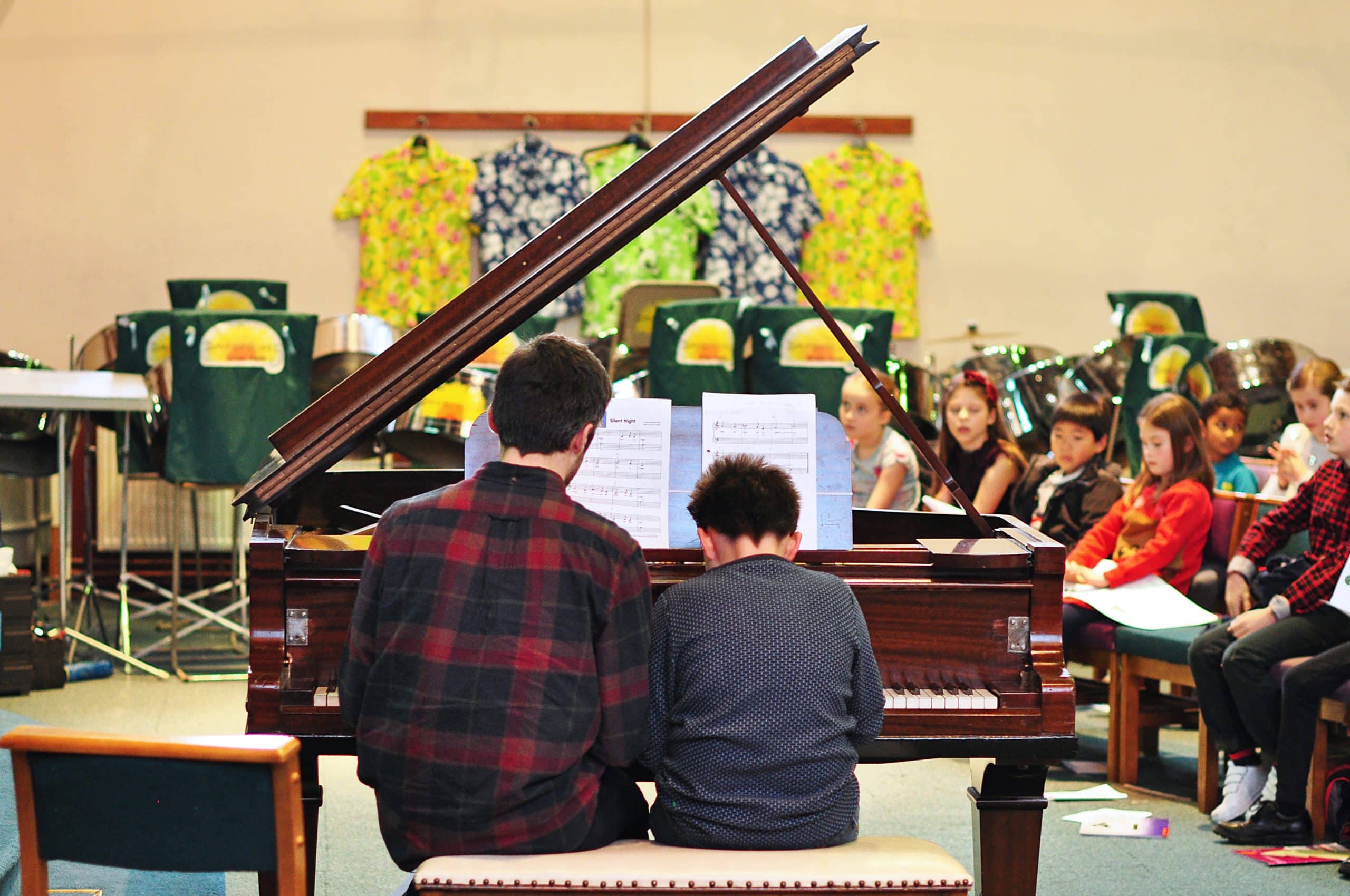 A student performs a duet at recital